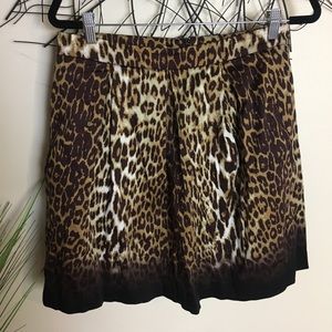 T TAHARI leopard print ombré mini skirt. Pockets